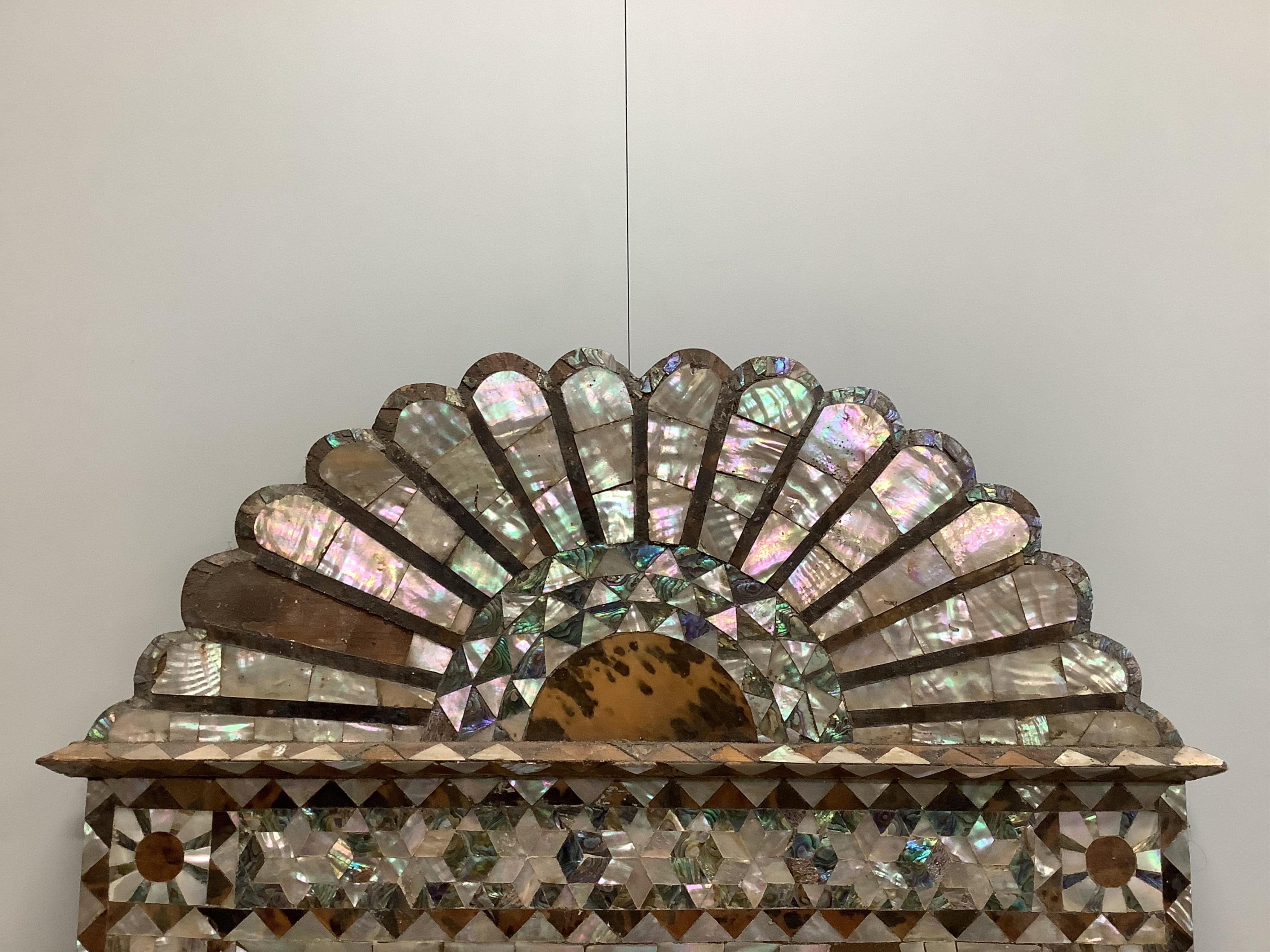 A 19th century Syrian mother-of-pearl and tortoiseshell inlay wall mirror, width 49cm, height 98cm. Condition - poor to fair